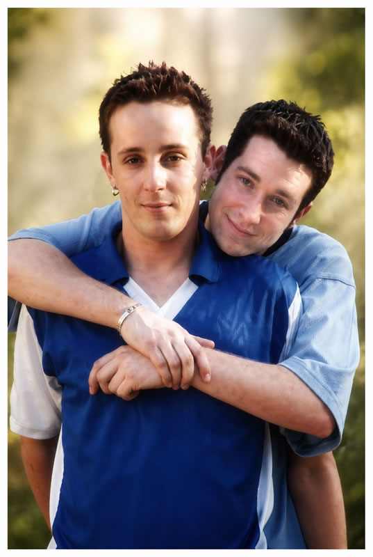 two young men embracing